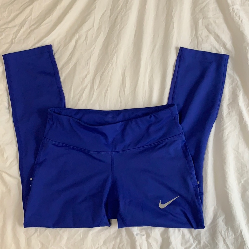Blue Nike athletic pants